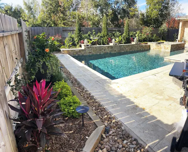 Poolside tropicals and travertine
