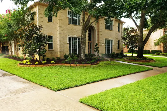Two-story with crisp edging and fresh beds