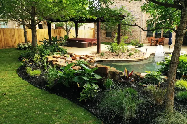 Pergola, spa and stone path