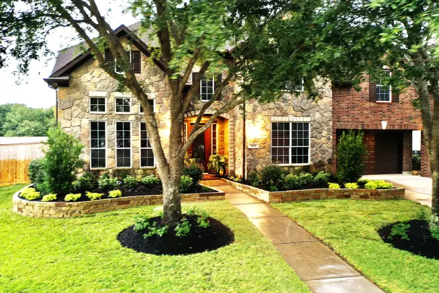 Stone cottage entry landscaping